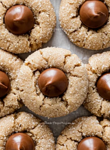 Classic Peanut Butter Blossoms cookies with chocolate kisses on top