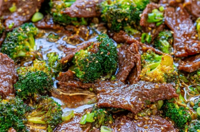 Cozy beef and broccoli dish served in a bowl with fresh vegetables.