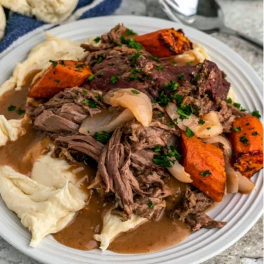 Cozy Crock Pot 3-Packet Pot Roast cooking in a slow cooker