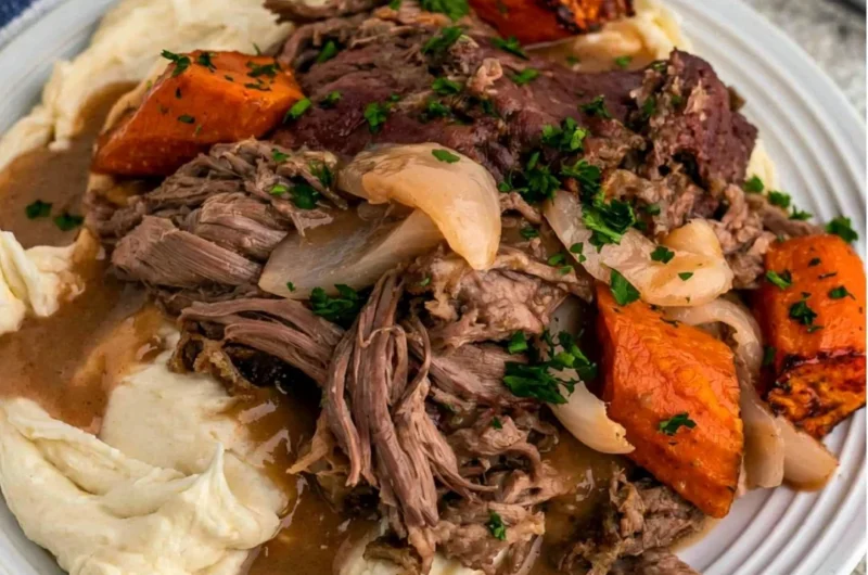 Cozy Crock Pot 3-Packet Pot Roast cooking in a slow cooker