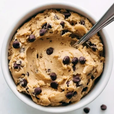 Cozy edible cookie dough in a bowl ready to enjoy.