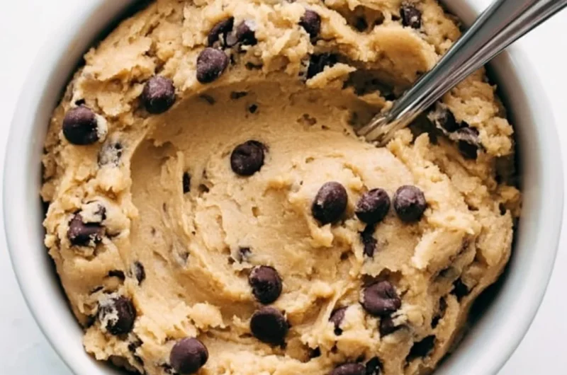Cozy edible cookie dough in a bowl ready to enjoy.