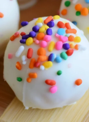Cozy no-bake cake batter truffles with colorful sprinkles