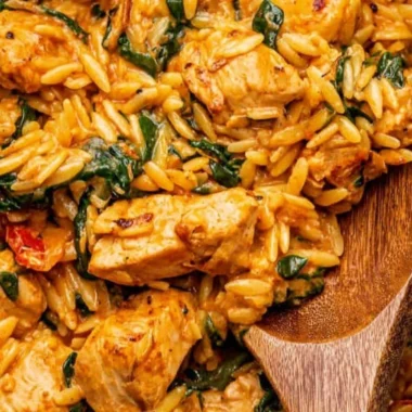 Creamy Cajun Chicken Orzo dish with vibrant spices and tender chicken