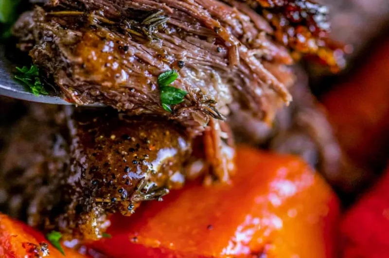 Delicious slow cooker pot roast served with vegetables.