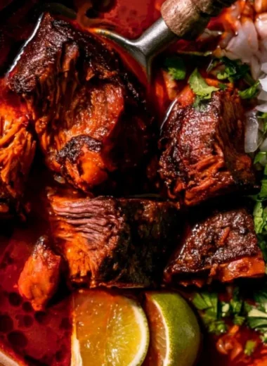 Delicious plate of Authentic Mexican Birria with traditional spices and toppings