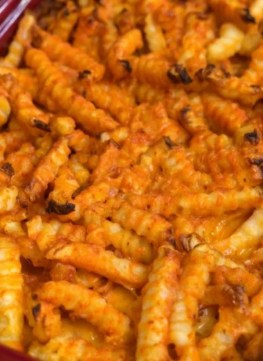 Cheeseburger Casserole with French fries on a baked dish