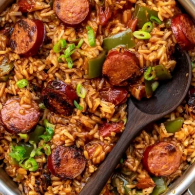 Cozy Cajun Sausage and Rice dish served in a bowl with vibrant vegetables