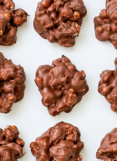 Delicious Cozy Rocky Road Candy made with chocolate, marshmallows, and nuts.