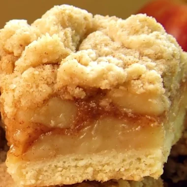 Delicious apple pie bars with a golden crust and spiced apple filling