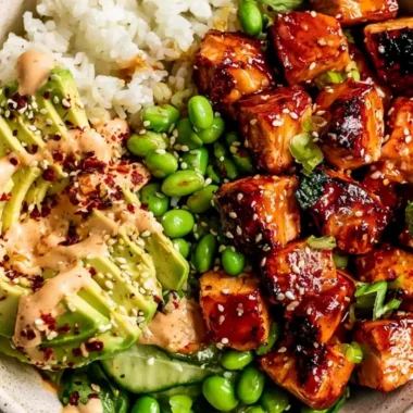Delicious Honey Sriracha Salmon served in a vibrant bowl with colorful vegetables.