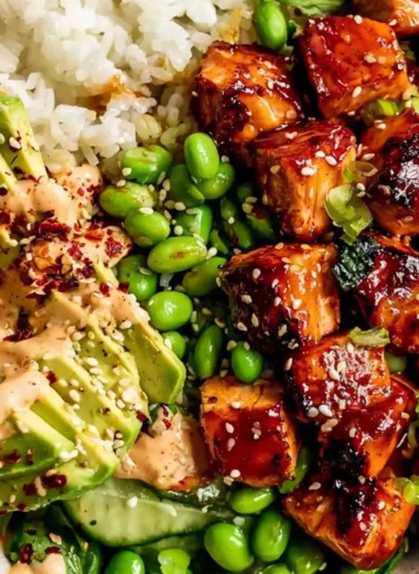 Delicious Honey Sriracha Salmon served in a vibrant bowl with colorful vegetables.