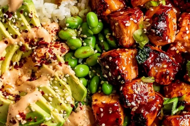 Delicious Honey Sriracha Salmon served in a vibrant bowl with colorful vegetables.