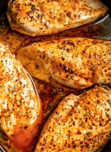 Delicious slow cooker chicken breasts served with vegetables for a comforting meal