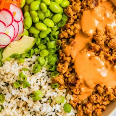 Bang Bang Ground Turkey Rice Bowl with fresh vegetables and rice