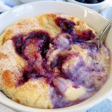 Healthy blueberry protein baked oats with no added sugar in a bowl.