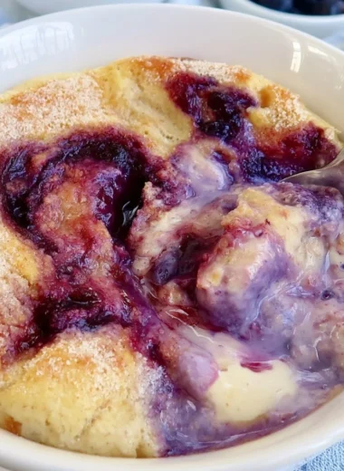 Healthy blueberry protein baked oats with no added sugar in a bowl.