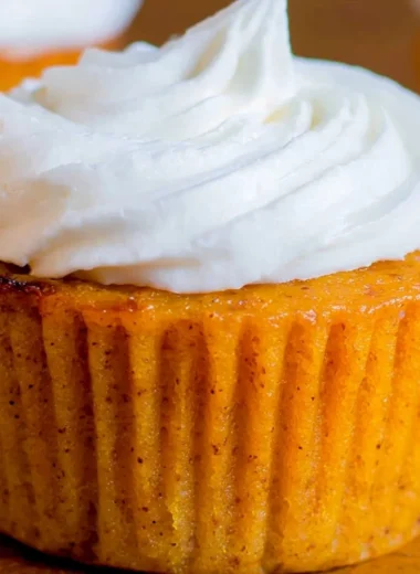 Delicious Impossible Pumpkin Pie Cupcakes topped with creamy frosting
