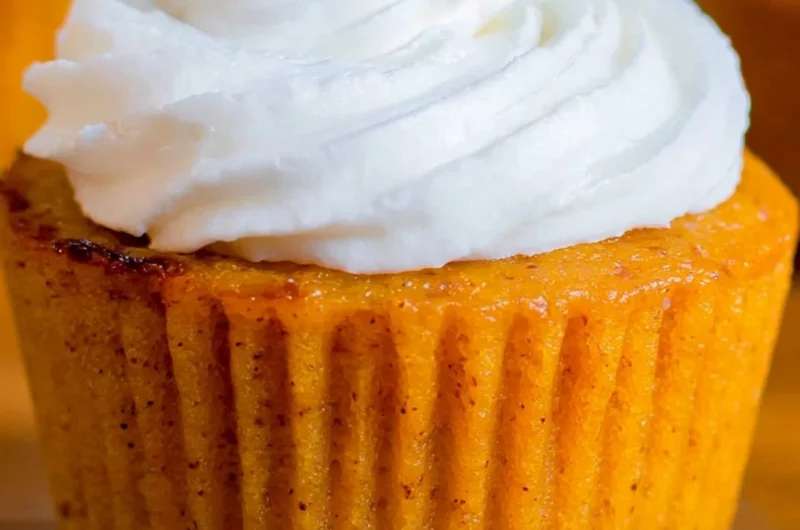 Delicious Impossible Pumpkin Pie Cupcakes topped with creamy frosting