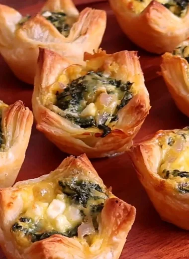 Delicious homemade spinach puffs served on a platter.