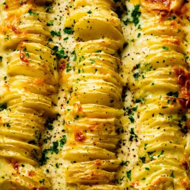 Deliciously cheesy best scalloped potatoes dish served in a baking dish
