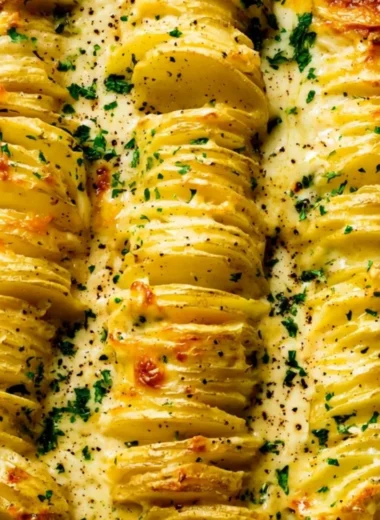 Deliciously cheesy best scalloped potatoes dish served in a baking dish